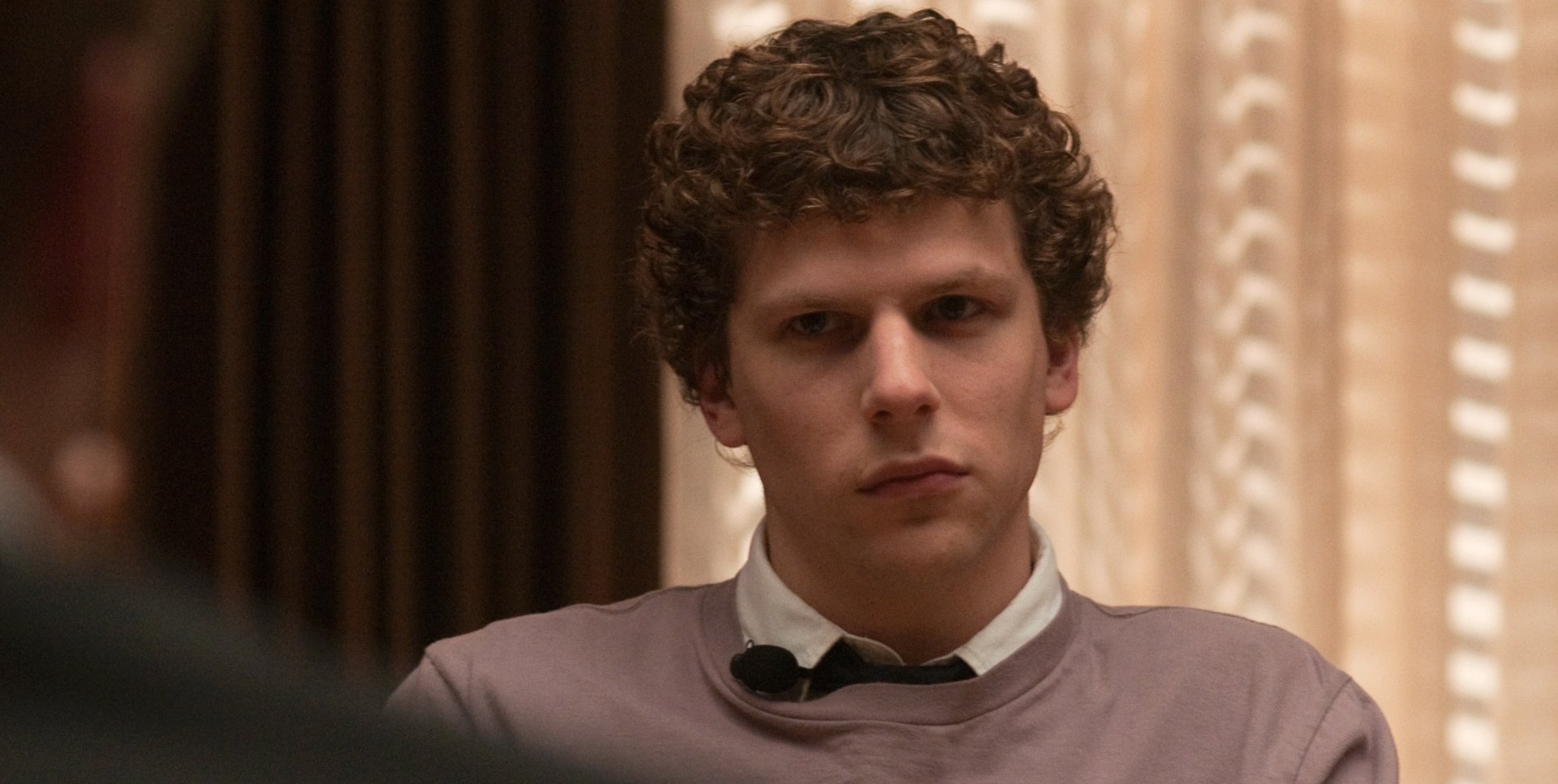 HD desktop wallpaper featuring Jesse Eisenberg from the movie The Social Network.