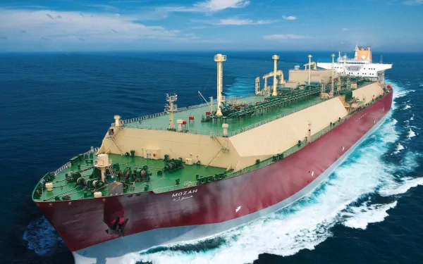 HD PC desktop wallpaper showing a large tanker vessel cruising through the ocean under a clear blue sky.