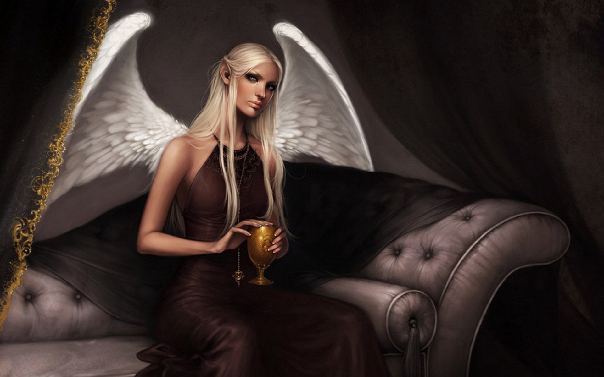 Fantasy-themed HD PC desktop wallpaper featuring a serene angel with white wings, long blonde hair, and a dark flowing dress, seated on an elegant tufted sofa holding a golden chalice.