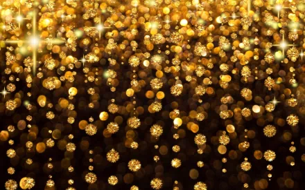 Bokeh effect in golden hues creates a shimmering, artistic backdrop, enhancing your HD PC desktop wallpaper with eye-catching depth and vibrancy.