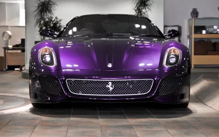 Purple Ferrari 599 GTB Fiorano front view in a showroom, 2K Quad HD PC desktop wallpaper background.