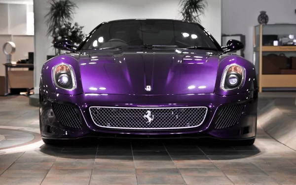 Purple Ferrari 599 GTB Fiorano front view in a showroom, 2K Quad HD PC desktop wallpaper background.