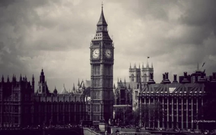 A stunning HD wallpaper of Big Ben in London, showcasing the iconic clock tower against a dramatic sky, highlighting the beauty of man-made architecture.