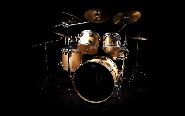 A stunning HD wallpaper featuring a polished drum set against a black background, showcasing the intricate design and vibrant colors of the drums and cymbals.