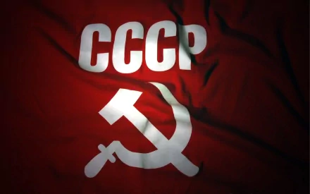 The image features the flag of the USSR, showcasing the emblematic hammer and sickle against a red backdrop, making it a striking HD desktop wallpaper.