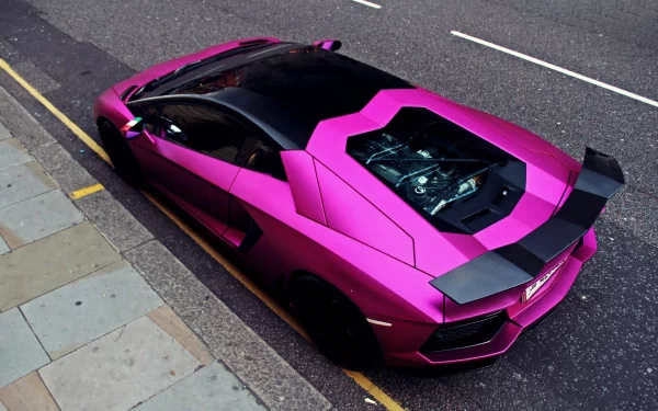 Top-down view of a magenta Lamborghini Aventador parked at a curb, engine visible — HD PC desktop wallpaper background