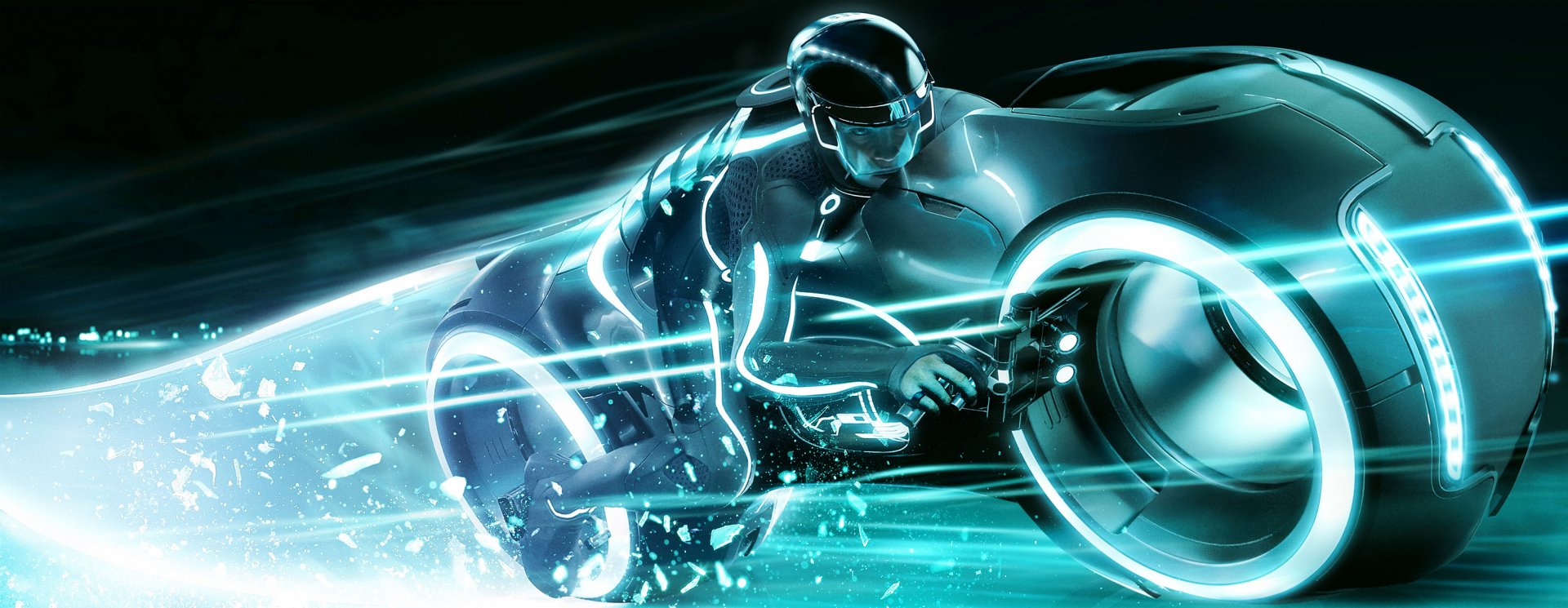 TRON: Legacy HD PC desktop wallpaper — glowing blue light cycle and rider in illuminated black suit racing through streaking neon light.