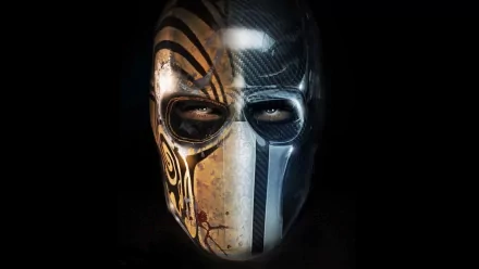 A striking HD wallpaper featuring the iconic mask from the video game Army of Two: The Devil's Cartel, showcasing intricate designs and a dark, intense atmosphere.