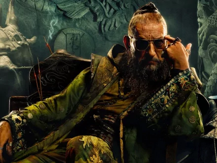 HD PC desktop wallpaper featuring a character from the movie Iron Man 3 seated confidently against an intricately detailed, dark, atmospheric background.