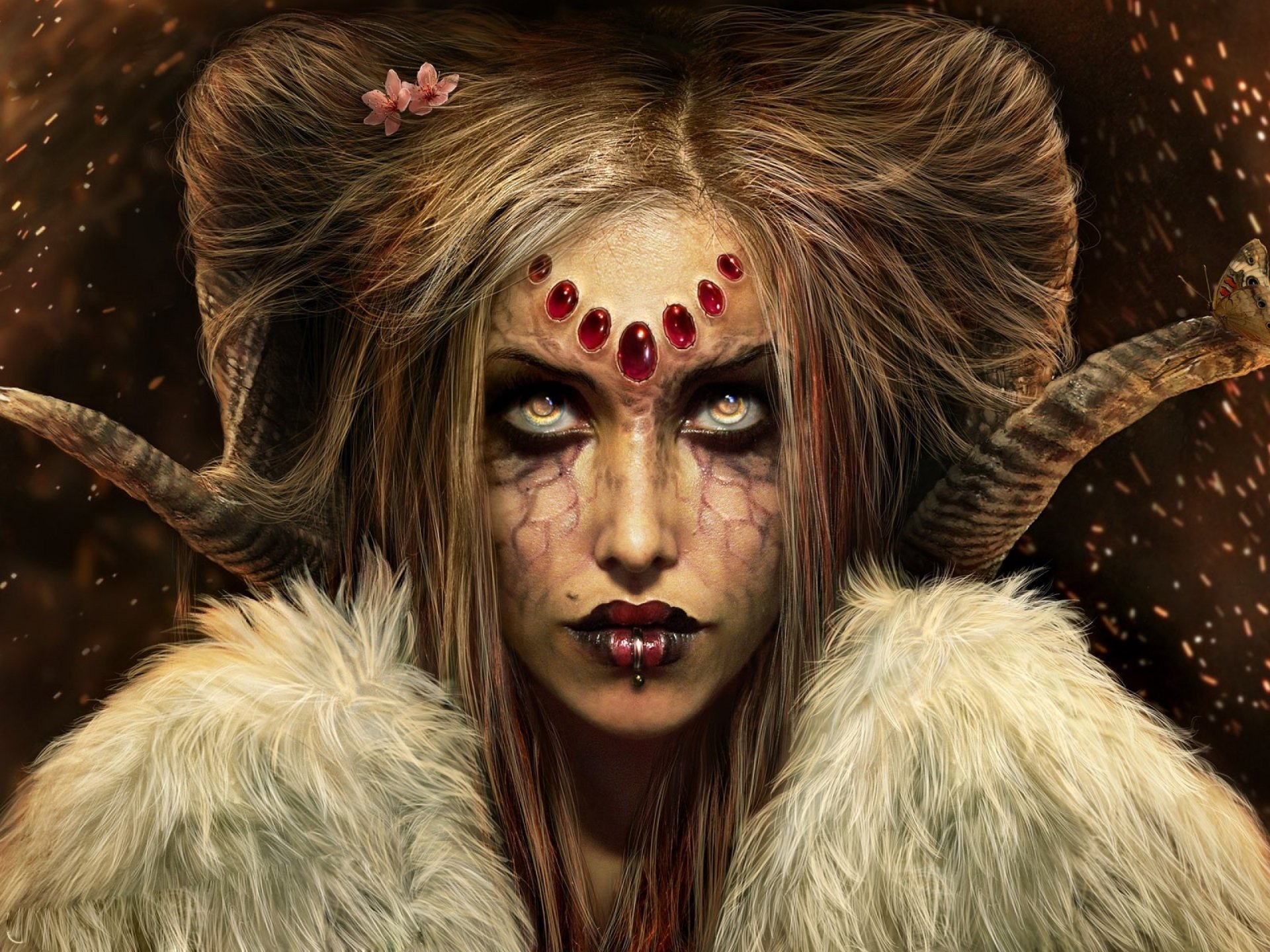 HD PC desktop wallpaper featuring a dark demon with glowing eyes, adorned with red gems and horns, set against a shadowy, intense background.