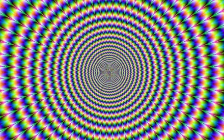 Vibrant abstract design featuring concentric circles in a spectrum of colors, creating a mesmerizing mind teaser. An engaging HD wallpaper for a dynamic desktop background.