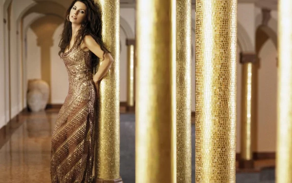 HD PC desktop wallpaper featuring Shania Twain in a shimmering gold gown, standing beside ornate golden columns in an elegant, music-inspired setting.