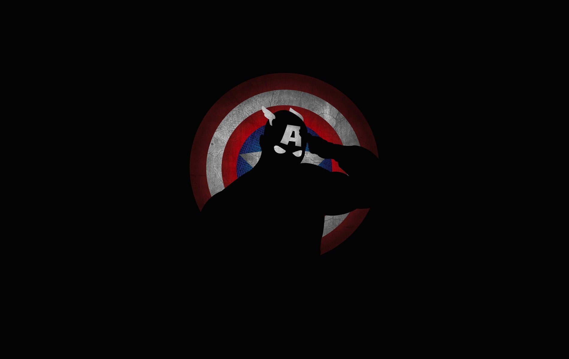 HD comic-style desktop wallpaper featuring Captain America saluting with his iconic shield glowing against a dark background.