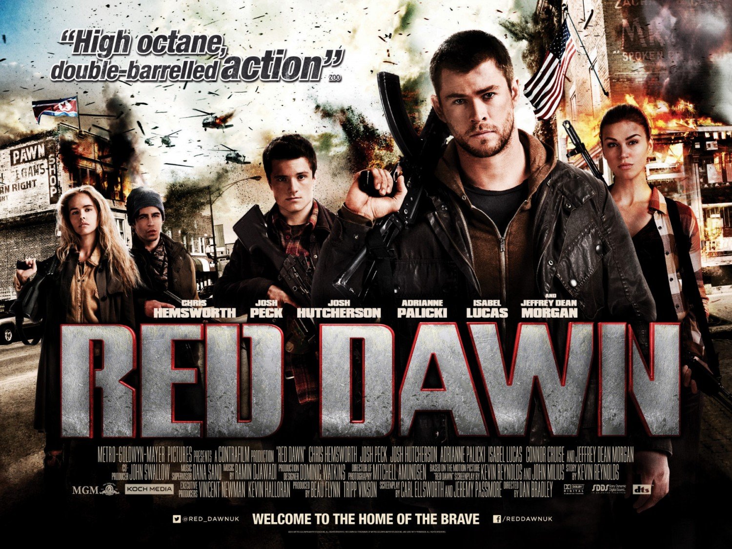 HD PC desktop wallpaper poster for Red Dawn (2012): a group of armed young fighters stand amid a burning, war-torn town beneath a large RED DAWN title.