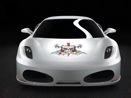 Front view of a white Ferrari F430 vehicle with skull crest hood decal on a black backdrop — 2K Quad HD PC desktop wallpaper/background.