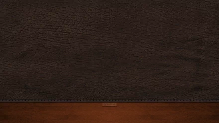 HD PC desktop wallpaper featuring an abstract, textured dark brown surface above a wooden base, creating a rich and minimalist background.