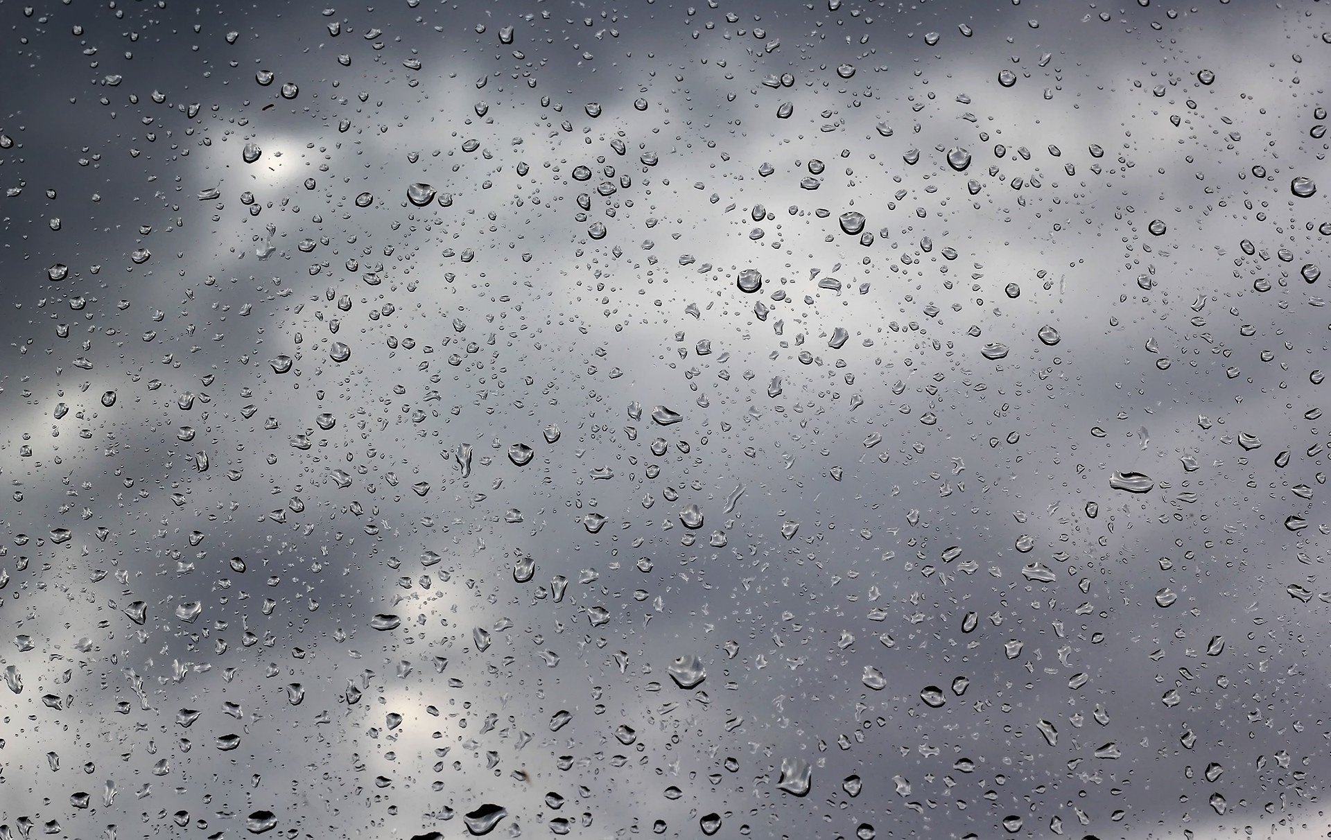 Photography of raindrops on a window with cloudy sky, HD PC desktop wallpaper and background.