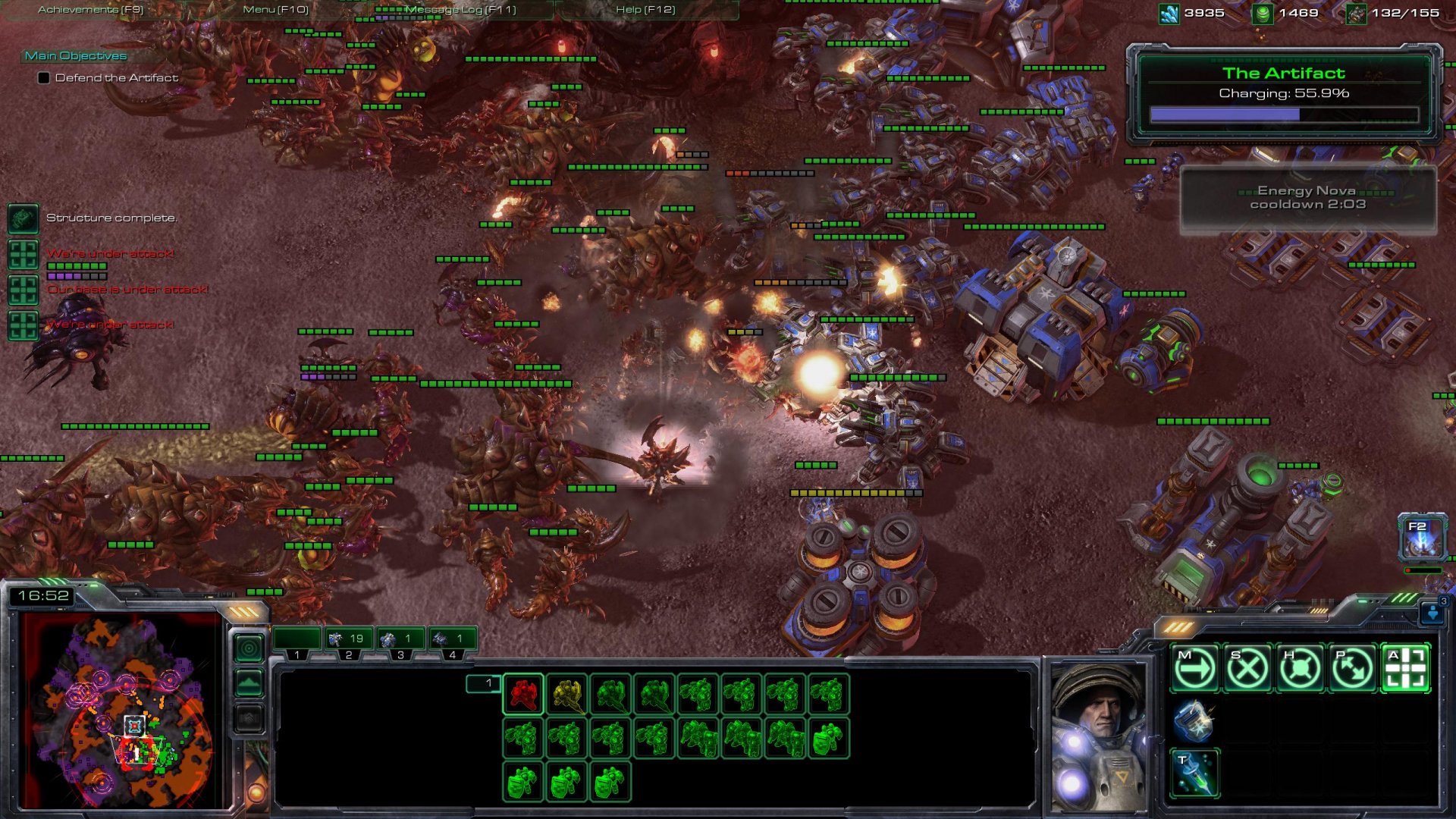 HD wallpaper featuring an intense battle scene from StarCraft II: Heart of the Swarm, showcasing various units and an in-game interface.