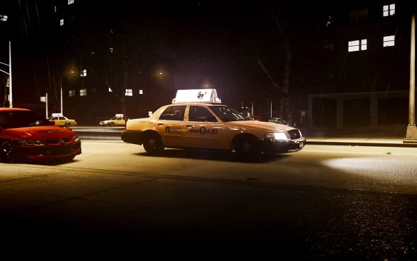 HD desktop wallpaper from Grand Theft Auto IV featuring a police car at night on a city street.