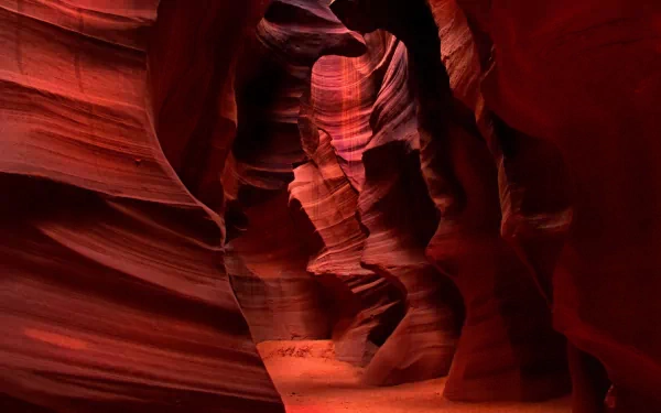 HD PC desktop wallpaper showcasing the natural beauty of Antelope Canyon with its smooth, flowing red sandstone formations and warm lighting.