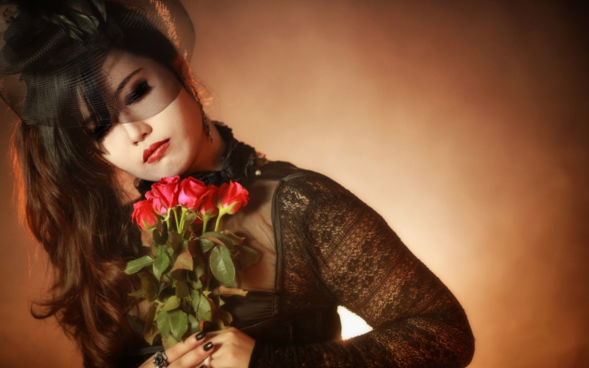 A woman with Asian features holds roses, wearing a lace top against a warm, softly blurred background, creating a striking HD desktop wallpaper.