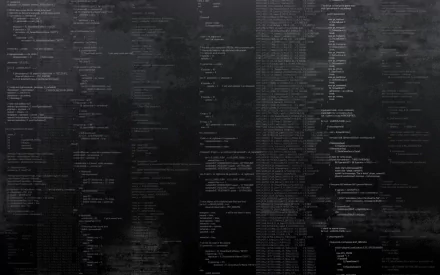 A greyscale digital wallpaper featuring a complex pattern of binary code and programming text, creating a sleek and modern technological aesthetic for desktop backgrounds.