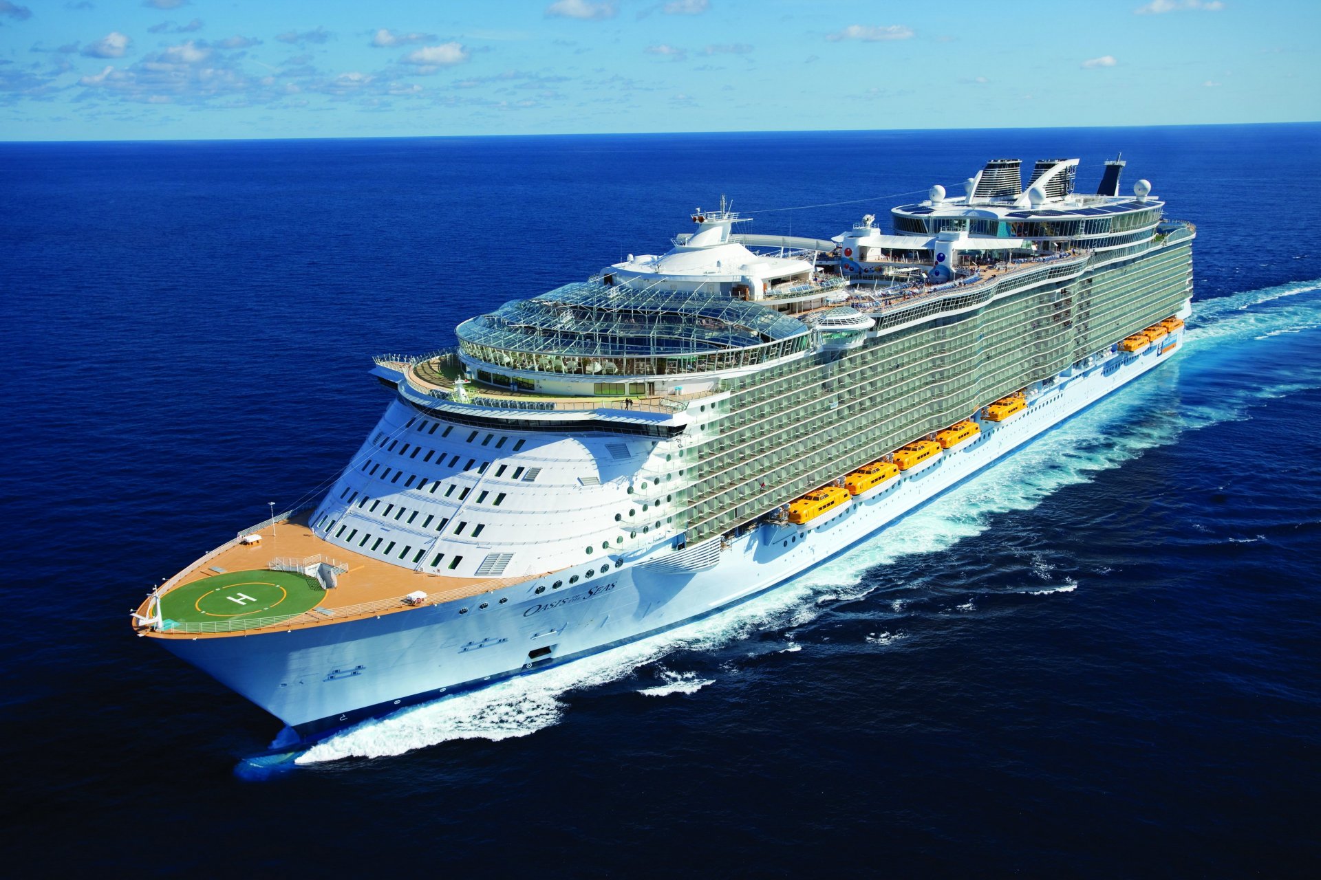 HD desktop wallpaper of the Oasis of the Seas cruise ship sailing on the ocean, showcasing this large vehicle from a high-angle view.