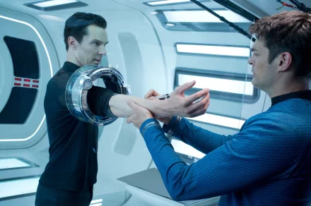 HD PC desktop wallpaper depicting a scene from the movie Star Trek Into Darkness, featuring two characters in a futuristic setting with advanced technology.
