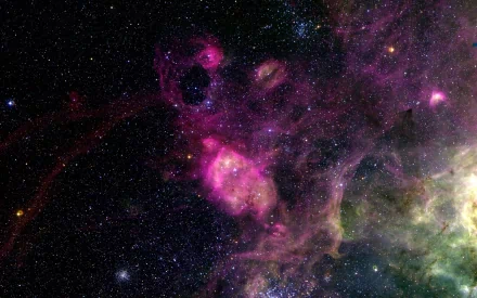 A stunning HD wallpaper featuring a vibrant sci-fi nebula, showcasing rich shades of purple and pink against a backdrop of twinkling stars in the vast universe.