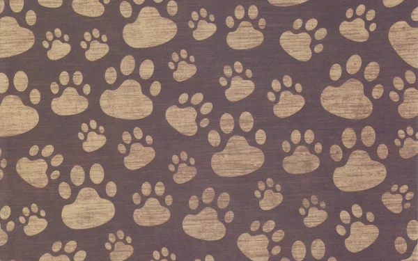 HD PC desktop wallpaper featuring an abstract pattern of textured paw prints arranged uniformly on a muted brown background.