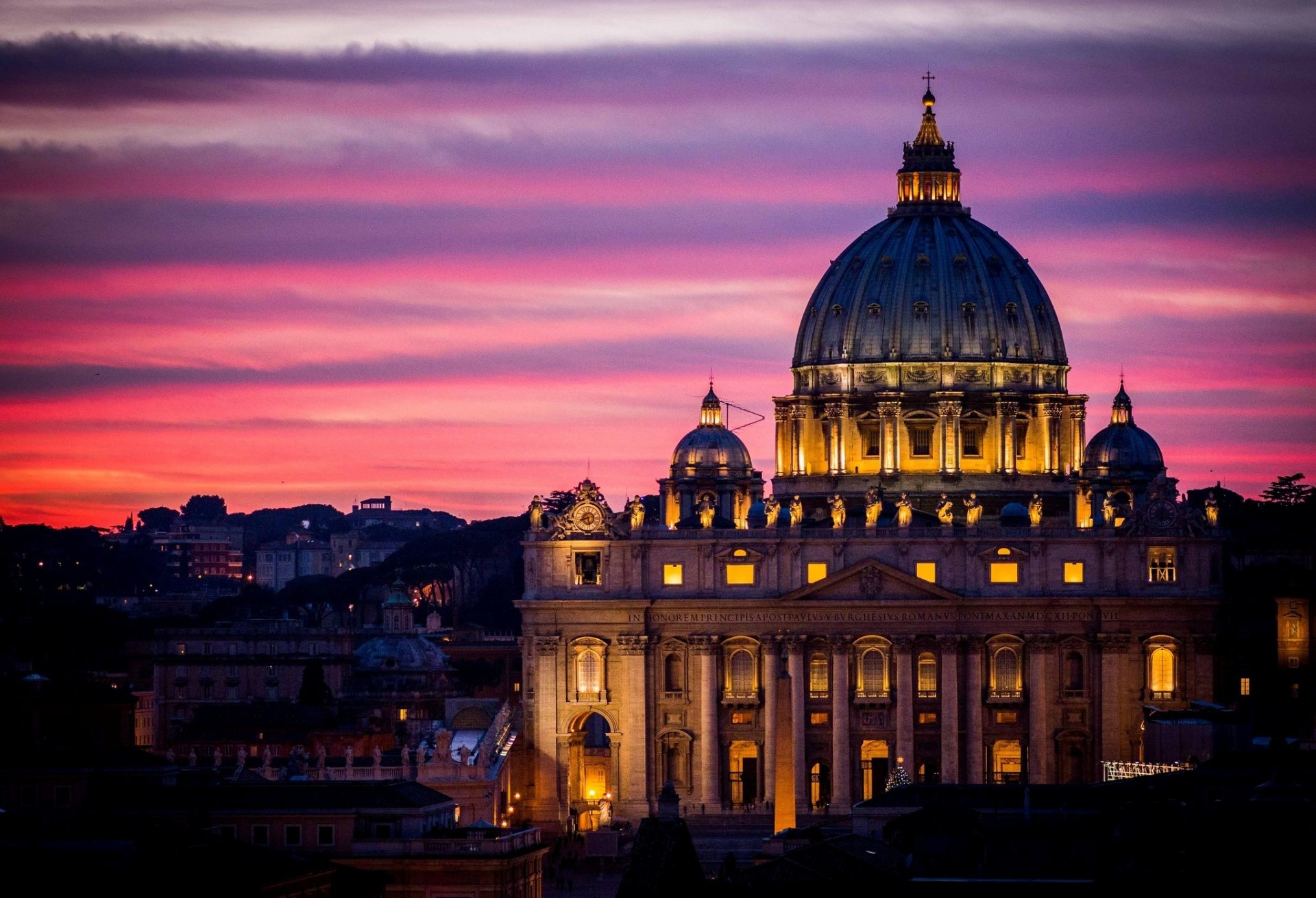 A stunning HD desktop wallpaper featuring the illuminated dome of a grand building against a vibrant sunset sky, showcasing man-made architectural beauty.