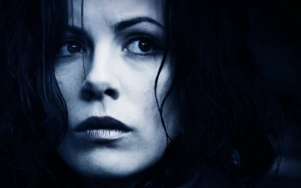 HD PC desktop wallpaper featuring a close-up of a character from the movie Underworld: Evolution, highlighting a dark and intense atmosphere.