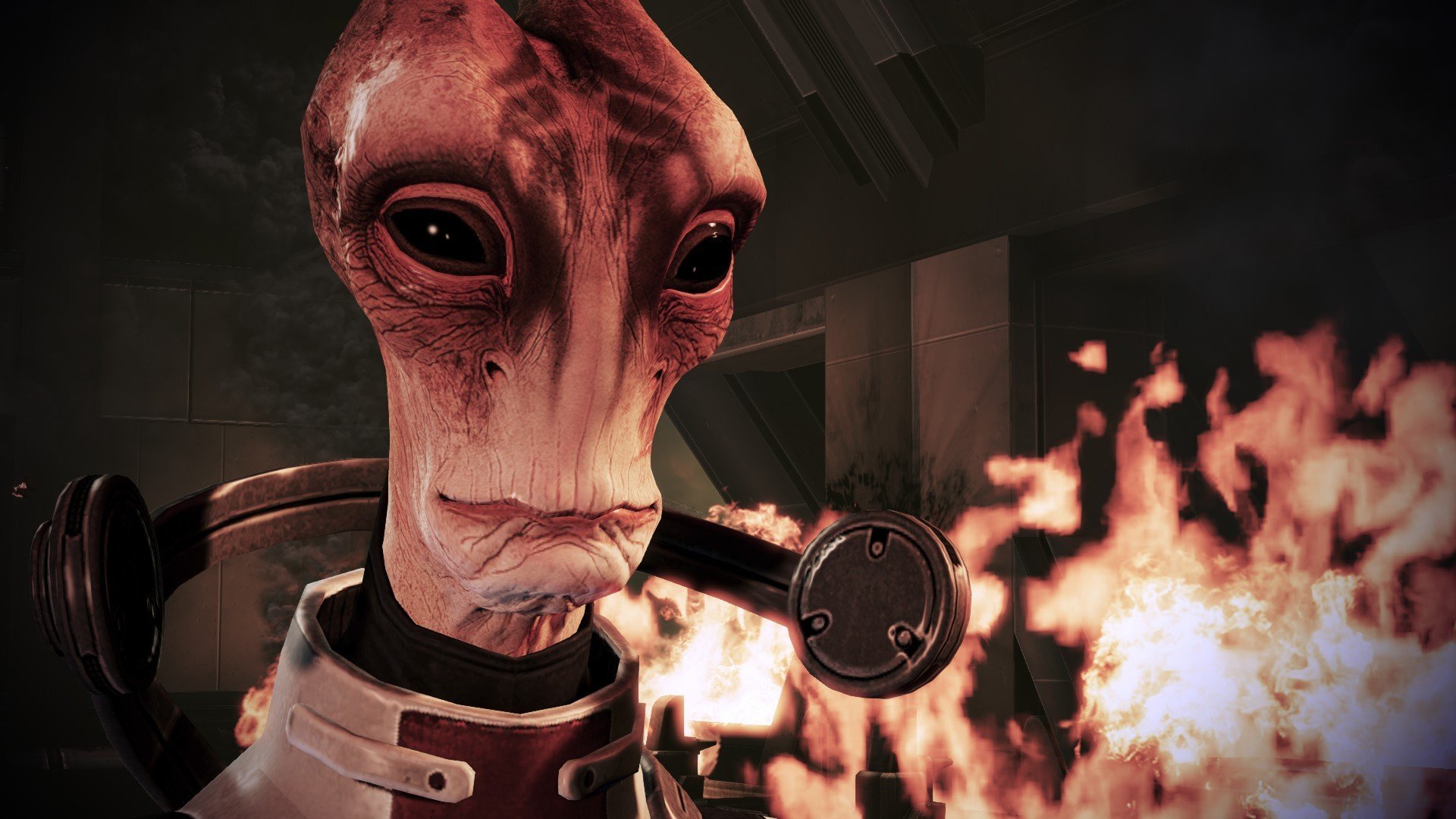 HD PC desktop wallpaper of Mordin Solus from the Mass Effect 3 video game: close-up of the Salarian scientist with a pipe and flames behind him.