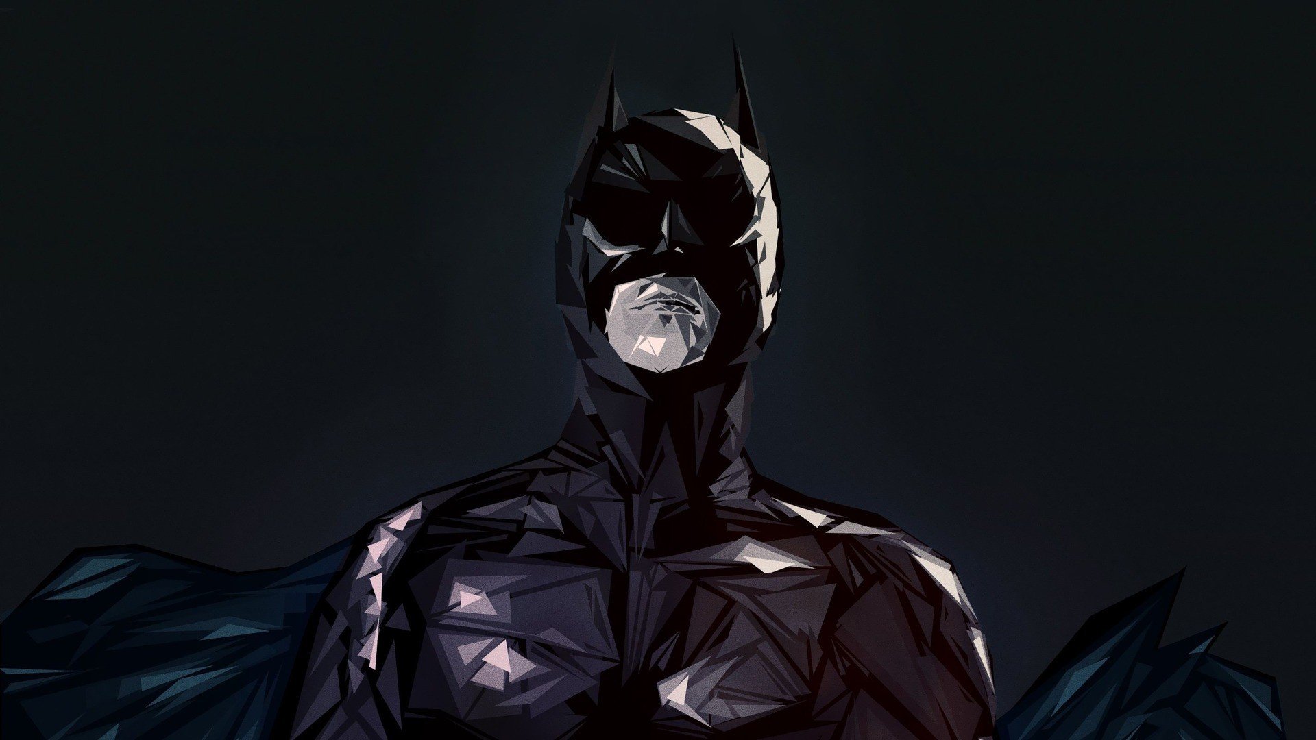 HD comic-style PC desktop wallpaper of Batman: a faceted, shadowed figure in black cowl and armor, cape unfurling against a dark background.
