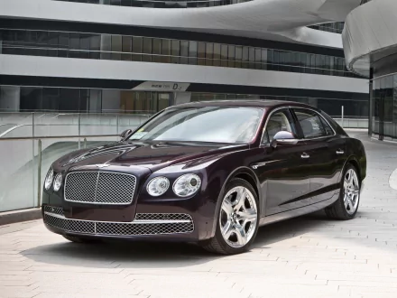 2013 Bentley Flying Spur, a sleek luxury car parked in a modern architectural setting, showcased as an HD PC desktop wallpaper and background.