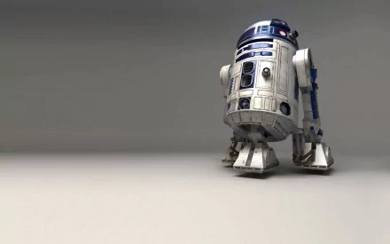 HD desktop wallpaper featuring R2-D2 from Star Wars, showcasing the iconic astromech droid with its distinctive blue and white design against a simple background.
