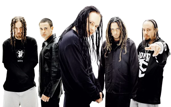 HD PC desktop wallpaper featuring the band Korn, showcasing its five members against a white background with a music theme.