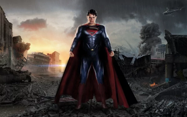 HD desktop wallpaper featuring Henry Cavill as Superman from the movie Man of Steel, standing confidently amidst a dramatic, war-torn cityscape at dawn.