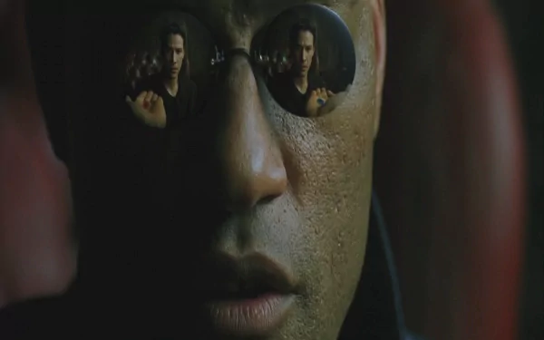 HD PC desktop wallpaper featuring a close-up of Morpheus from The Matrix, with his iconic reflective sunglasses showing Neo reaching out.