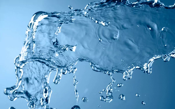 A close-up of flowing water creates a dynamic visual, showcasing the beauty of nature. This HD image serves as a captivating desktop wallpaper and background.