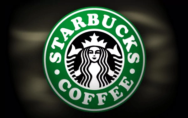 HD desktop wallpaper featuring the iconic man-made Starbucks Coffee logo with a glowing effect on a dark background.