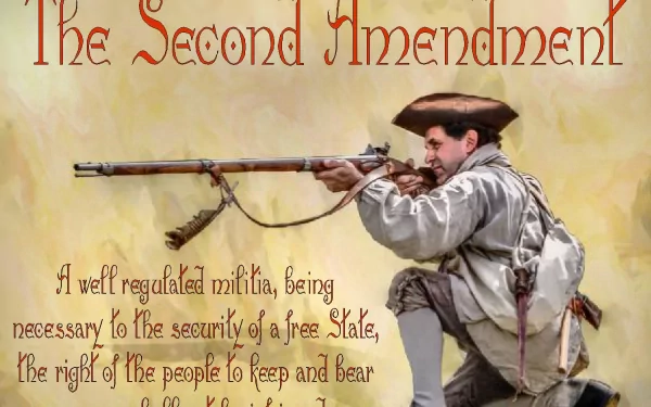 HD PC desktop wallpaper featuring a historical reenactor aiming a musket, with text of the Second Amendment prominently displayed.