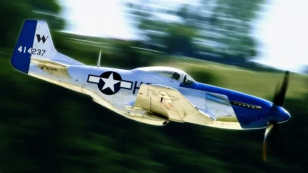 A North American P-51 Mustang military aircraft soars through the sky, captured in dynamic motion. This HD image serves as a striking desktop wallpaper and background.
