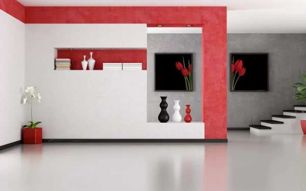HD PC desktop wallpaper of a modern, man-made room featuring minimalist decor with red, white, and black accents, including vases, flowers, and sleek staircase.