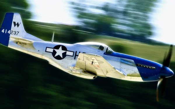 A North American P-51 Mustang military aircraft soars through the sky, captured in dynamic motion. This HD image serves as a striking desktop wallpaper and background.