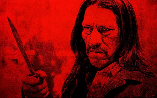 HD desktop wallpaper featuring a vivid red-toned image of the movie Machete Kills with a man holding a machete in a tense pose.