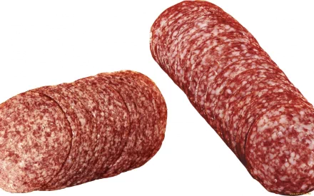 HD PC desktop wallpaper featuring close-up of sliced and whole salami, highlighting its rich texture and deep red color.
