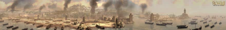 HD desktop wallpaper from the video game Total War: Rome II, depicting a detailed coastal siege scene with ships and smoke rising over ancient fortress walls.