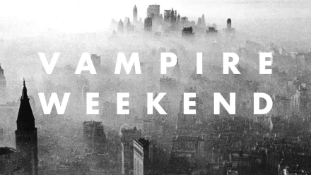 Monochrome foggy aerial cityscape overlaid with bold white VAMPIRE WEEKEND text — HD PC desktop wallpaper/background referencing the music of Vampire Weekend.