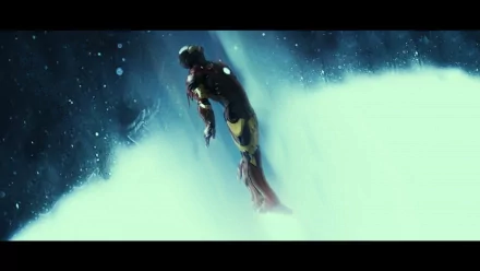 Movie scene from Iron Man 3: Iron Man hovering through a luminous snow-like mist with blue cinematic tones — HD PC desktop wallpaper and background.